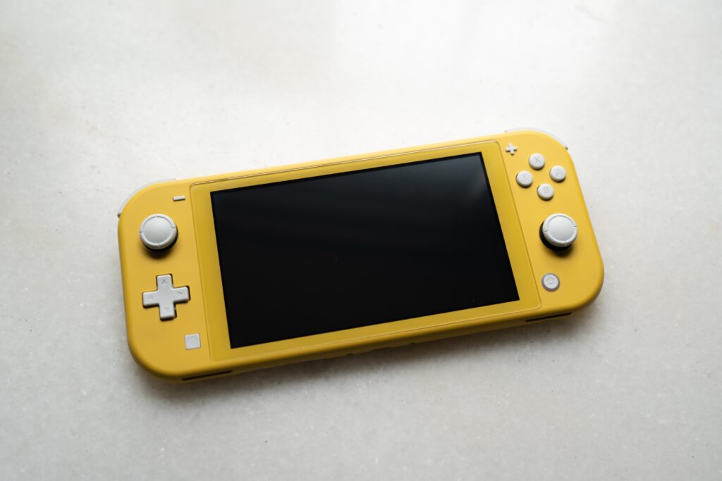 A Yellow Nintendo Switch Lite Console