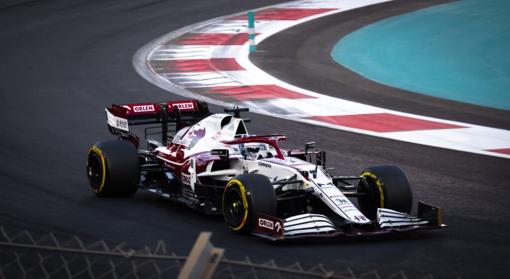 A red and white F1 car on track
