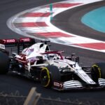 A red and white F1 car on track