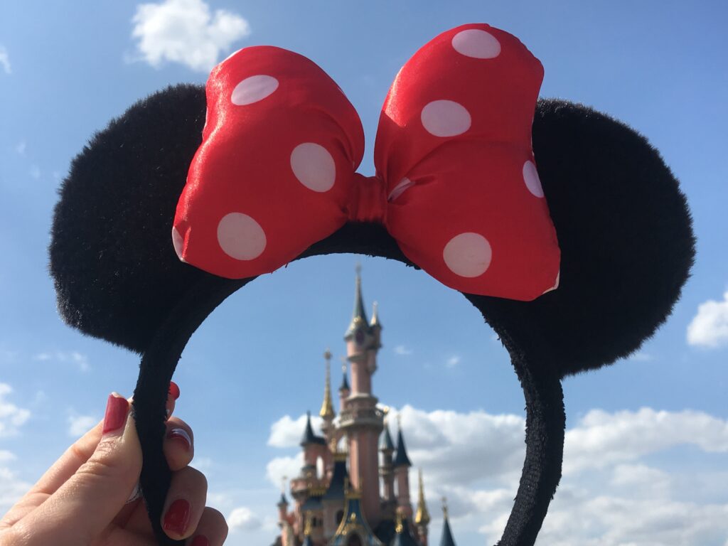 Minnie Mouse ears framing the Disney Castle - A perfect gift for Disney Lovers